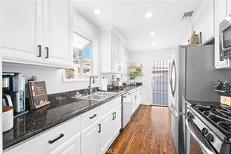 Building Photo - 9228 Coachman Ave