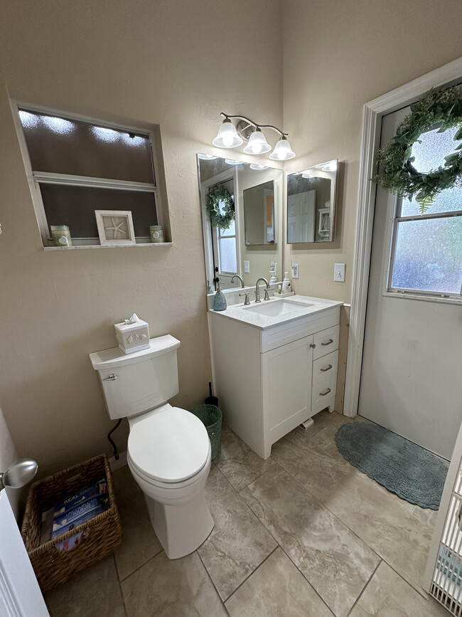 Master Bath has 3 sinks - 1305 SW 11th Plz