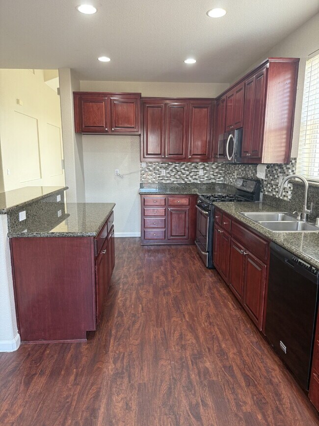Building Photo - Charming 4-Bedroom, 3-Bathroom Single-Family Home