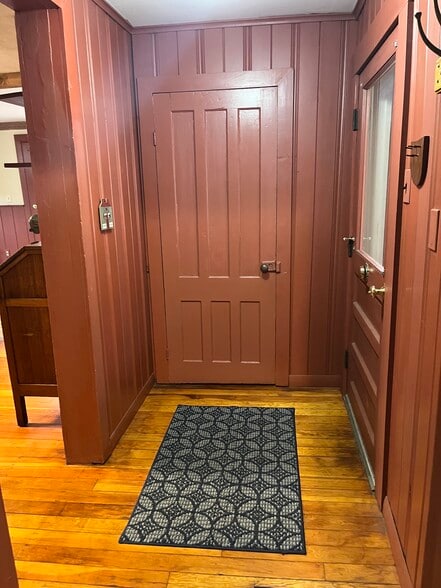 Mudroom off the side porch with pantry, kitchen and laundry entrances. - 11 Kellogg St