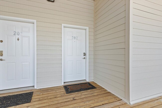 Building Photo - Riverfront Living with Spacious Layout and...