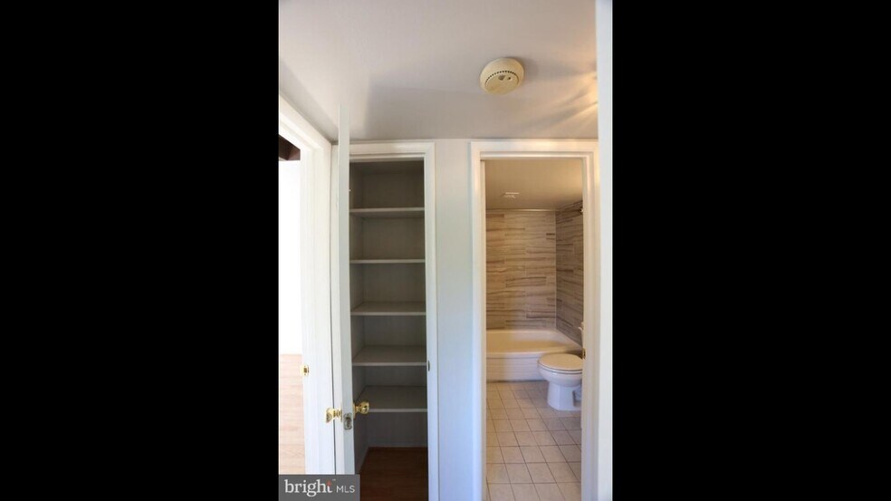 Linen closet next to bathroom - 4949 Americana Dr