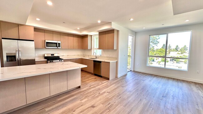 Building Photo - Stylish 2-Bedroom with In-Unit Laundry & B...