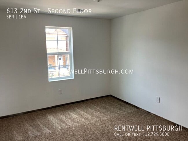 Building Photo - 613 2nd St
