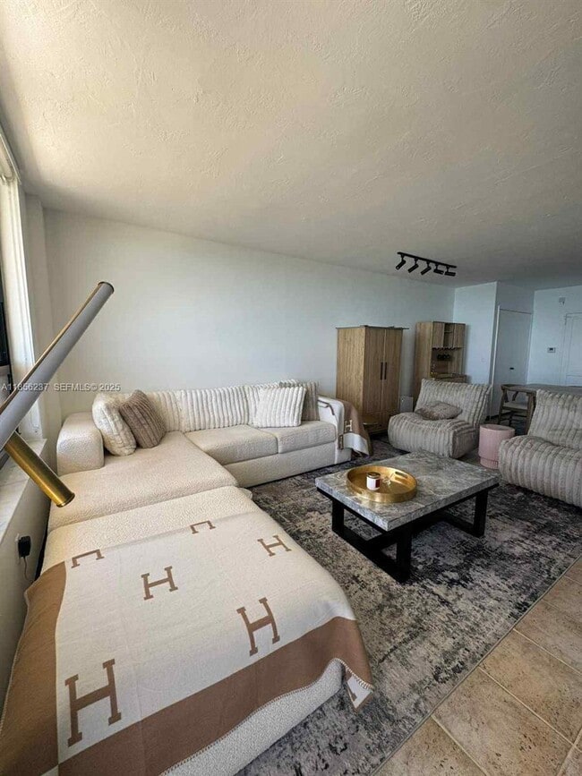 Building Photo - 10185 Collins Ave