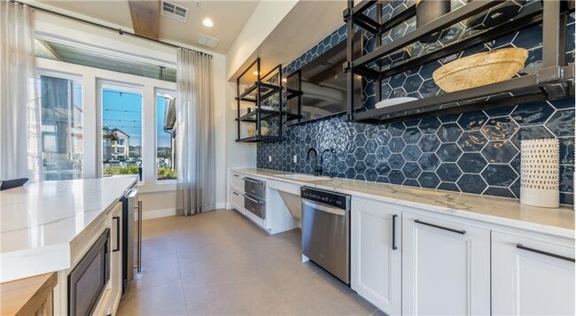 Building Photo - 6001 Ed Bluestein Blvd