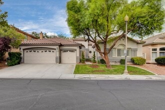 Building Photo - 4 bedroom, 3-bath home with a Pool!
