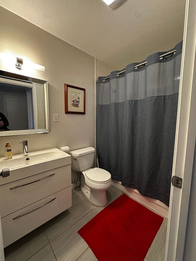 Building Photo - No Brokers Fee!! Spacious 2-Bed, 2-Bath Condo with 2 Parking Spots in Medford