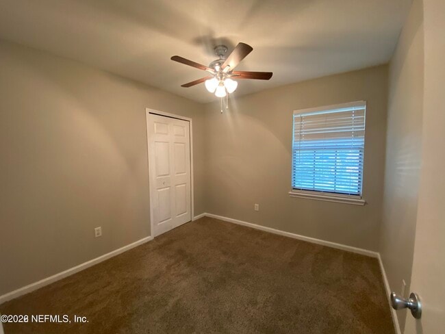 Building Photo - 8050 Voltaire Ct E