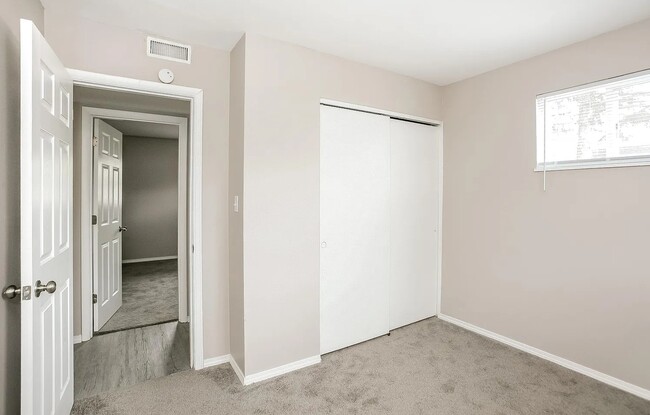 Fresh carpeted bedrooms with closet spaces and beautiful lighting as well. - 1902 E Calvert St