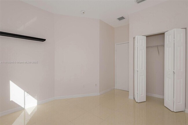 Building Photo - 4958 White Mangrove Way E