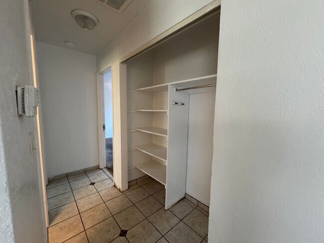 Building Photo - Two Bedroom Triplex with One Bathroom and ...