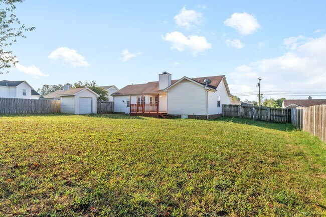 Building Photo - Adorable home with fenced back yard coming...