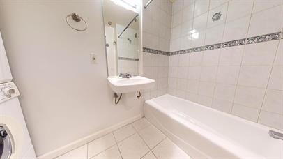 Building Photo - "Chic Urban Living: Spacious 2BR/2BA Condo...