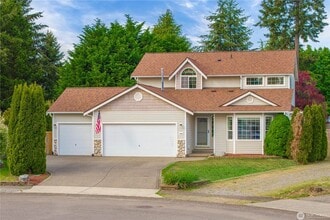 Building Photo - Enjoy this 3 bedroom, 2.5 bath home in the gated community of Stonerise