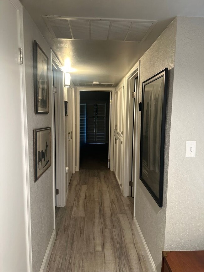 Building Photo - 3 Story condo near country club coming soon!