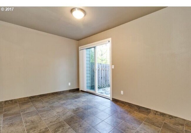 Building Photo - 9041 SW Rystadt Ln