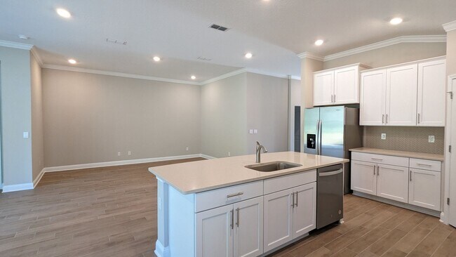 Building Photo - ENJOY this price on our 18mo Lease. Both 1...
