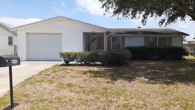 Building Photo - JUST REDUCED!!! 2/1.5/1 1000 Sq. Ft. NEW AC!!!Spacious living room, Lanai, fenced in yard, and ti...