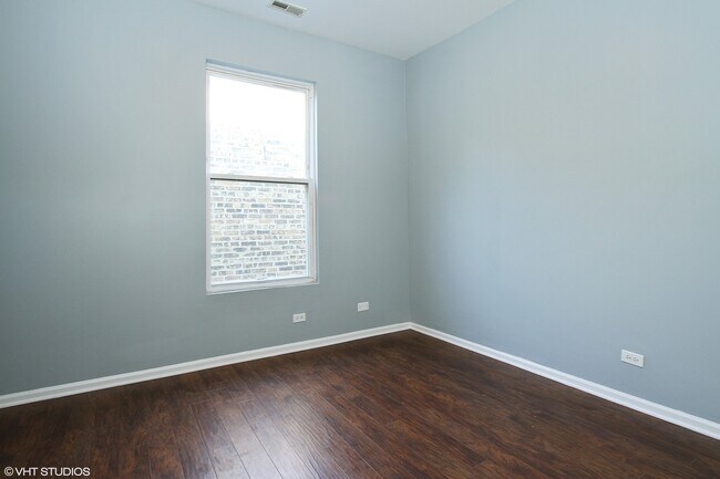 Building Photo - 6422 S Rhodes Ave