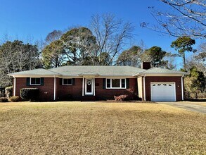 Building Photo - Available NOW! Lakefront 4 Bedroom/2 Bath Home, Pet-Friendly, Fenced Yard, Great School Zones!