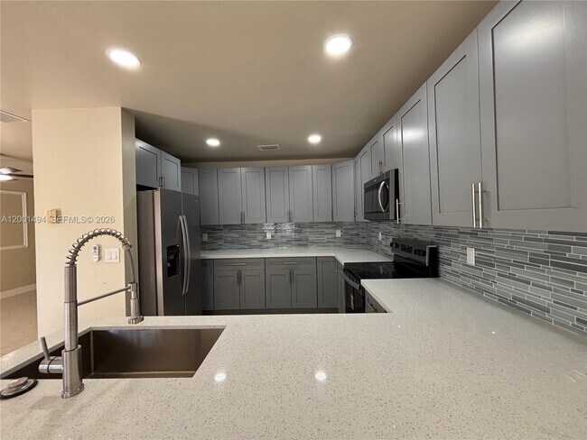 Building Photo - 5450 NW 94th Terrace