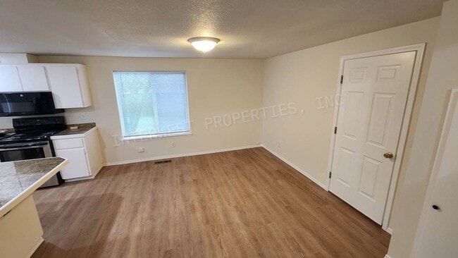 Building Photo - Remodeled 3 Bd Home W/ Washer & Dryer Hook-ups, Large Fenced Backyard, Gas Fireplace & 2 Car Garage!