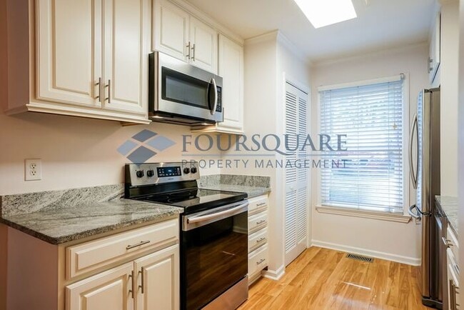Building Photo - Bright 2-Bed / 2.5-Bath Townhome with Fireplace, Back Deck & Open Living – Convenient to Cary
