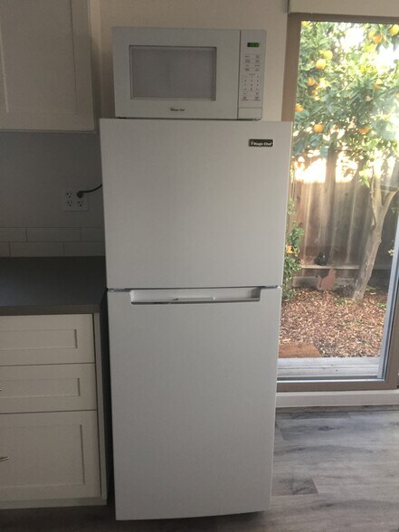 kitchen area with sliding door - 1052 8th Ave