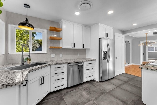 New Stainless/ wood/ tile kitchen