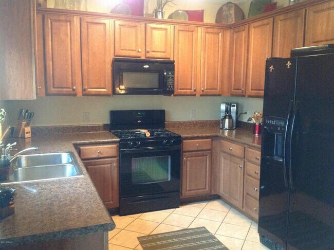 Building Photo - Pending/ Rented - Spacious Rita Ranch Home with Modern Comforts & Community Perks!