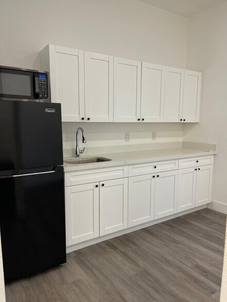 Kitchen with fridge, micro and storage space - 22916 SW 115th Ave
