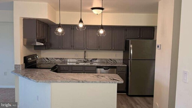 Building Photo - 8103 Greenspring Way