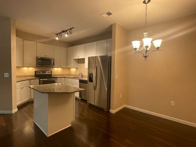 Building Photo - BEAUTIFUL CONDO with NEW LVP Flooring - AV...