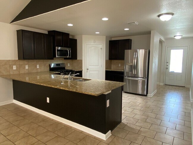 Building Photo - Spacious 4-Bedroom Home with Washer & Dryer Included in Riposa Vita Community!