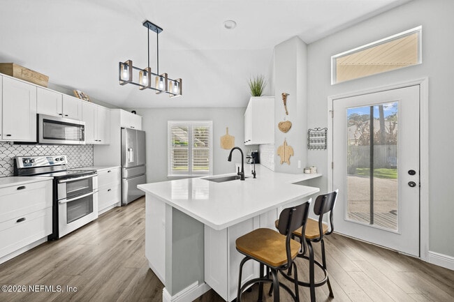 Building Photo - 13948 Spoonbill St N