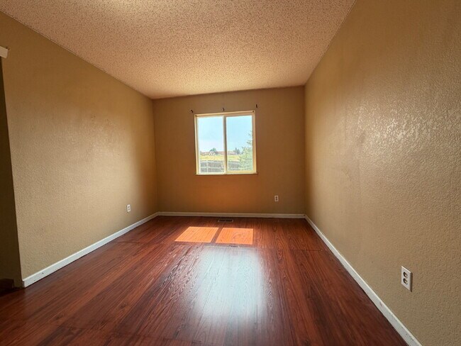 Building Photo - ~Available Now~  Beautiful Four Bedroom Home with Fireplace, Private Yard & Luxurious Primary Suite!