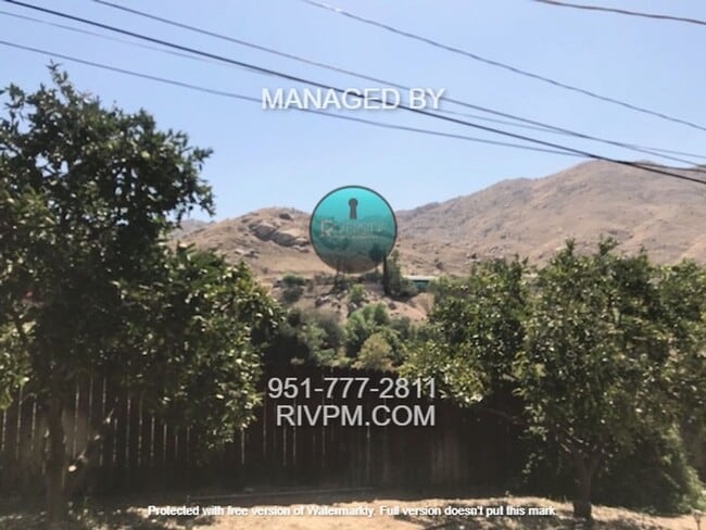 Building Photo - Nestled up against the hills with no one b...