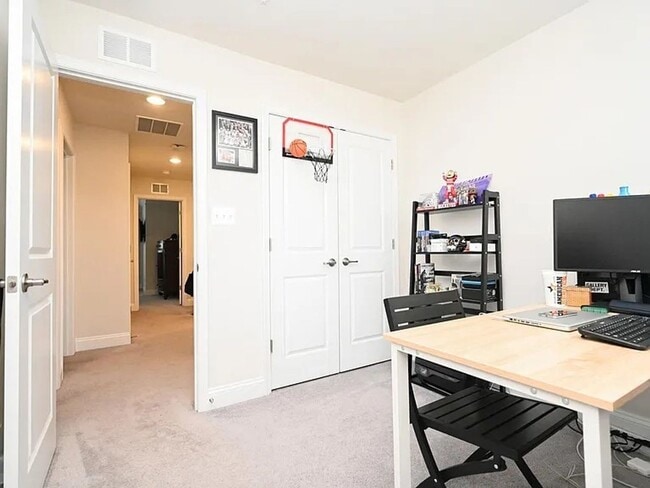 Building Photo - Stunning 3-Story Brick-Front Townhome | Modern Living + Military & First Responder Discount