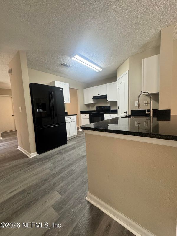 Building Photo - 7772 Playschool Ln