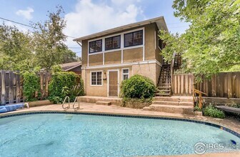 Building Photo - Charming Historic Carriage Home Steps from Pearl Street - Boulder Living at Its Finest!
