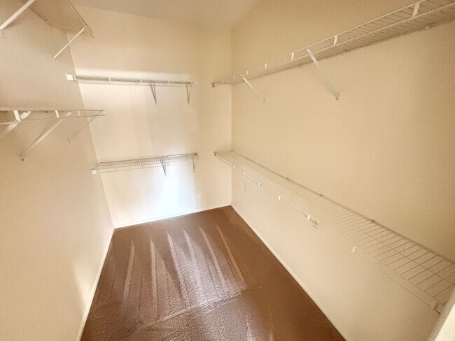 Building Photo - Charming 2Bed/Bath Condo located in a beautiful gated community in the Southwest.