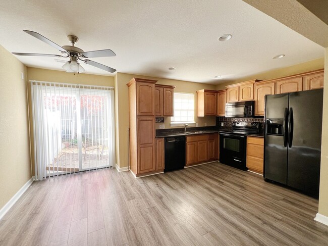 Building Photo - SEE IT NOW: Spacious 2-Bedroom Townhome with Modern Finishes and Garage!