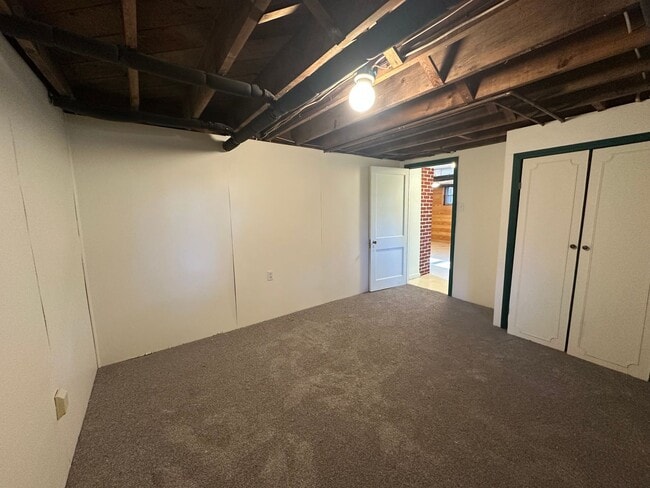 Building Photo - House in Bedford with Lot of Outdoor Space.
