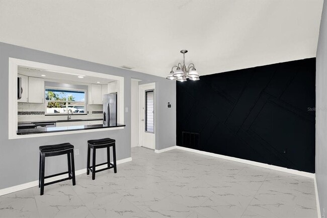 Building Photo - 7902 Canna Dr