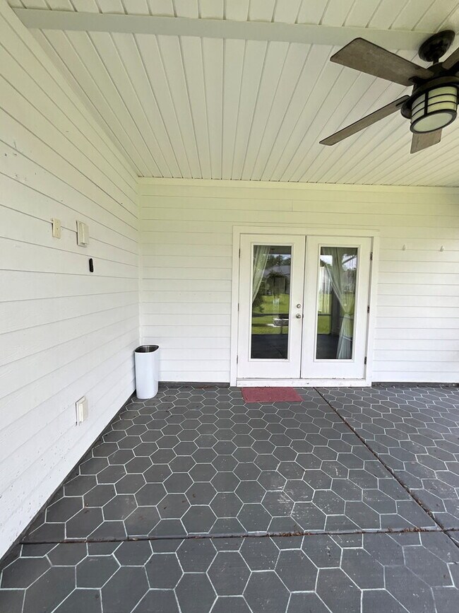 Building Photo - "Spacious 4-Bed Oasis with Stunning Lake V...