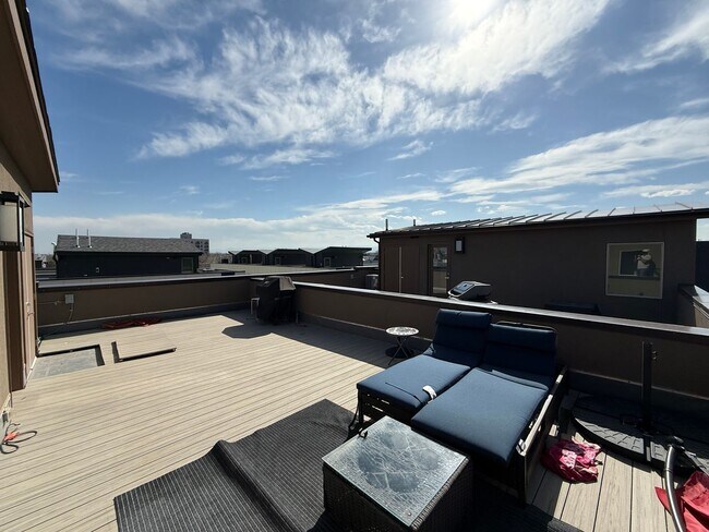 Building Photo - Modern Townhouse with Rooftop Deck & Mountain Views Near Sloan’s Lake!!