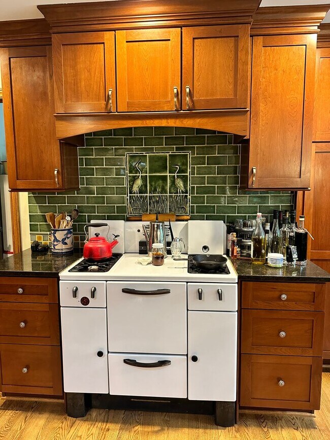 Building Photo - Dream Home in Highland, Michigan: Your Private Oasis on 5 Wooded Acres