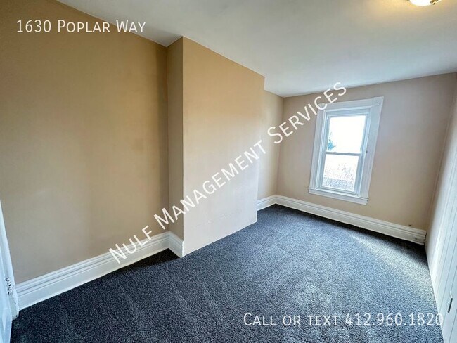 Building Photo - 1630 Poplar Ave