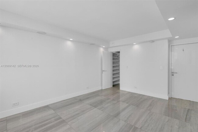 Building Photo - 5005 Collins Ave